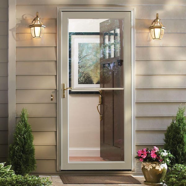 3000 Series 36 in. x 80 in. Almond Left-Hand Retractable Aluminum Storm Door with Brass Hardware