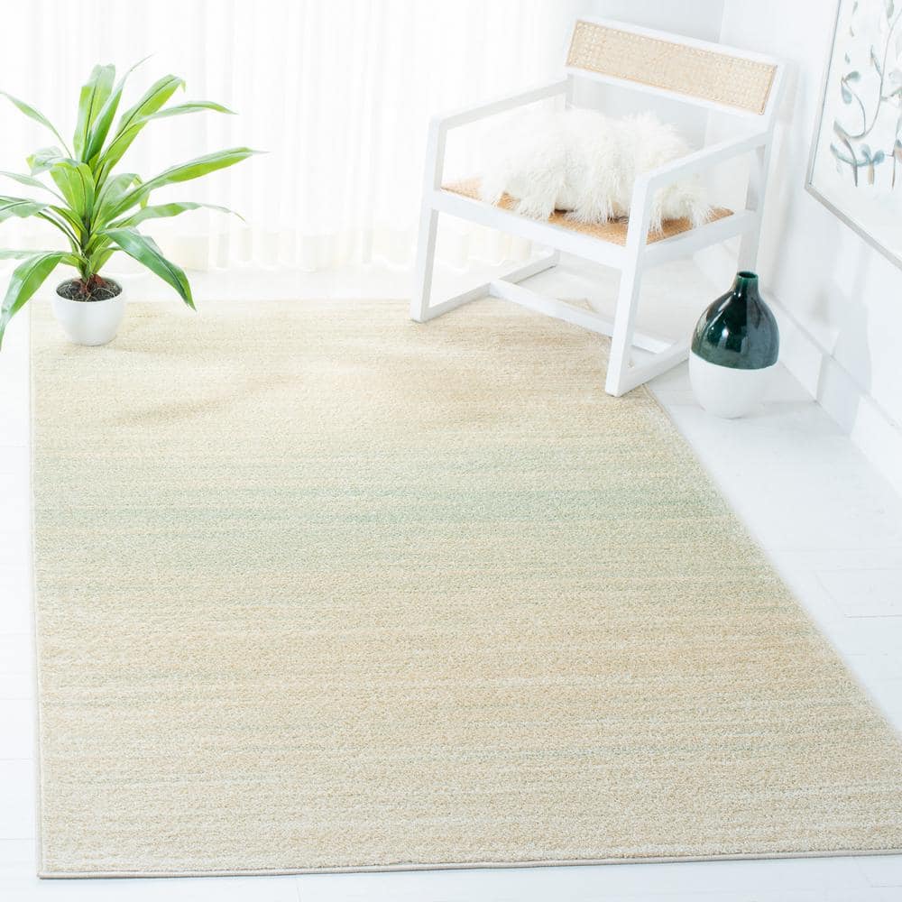 Green and Ivory Rectangular 9' x 12' Stain-Resistant Synthetic Rug