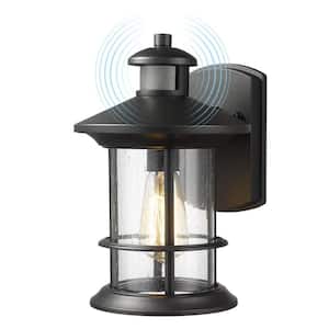 Black Motion Sensing Dusk to Dawn Outdoor Hardwired Wall Lantern Scone with Seeded Glass