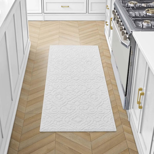 Feya Solid Ivory 2 ft. x 5 ft. Tufted Medallion Polypropylene Runner Rug