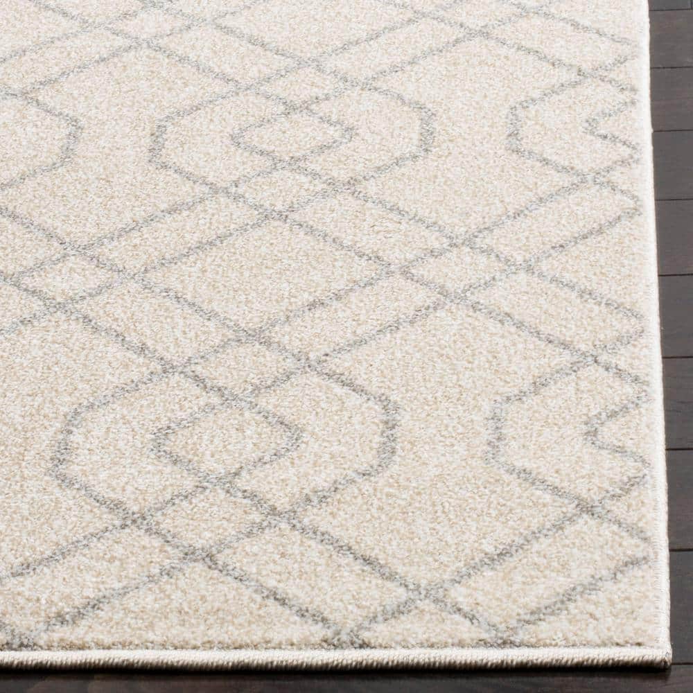 Ivory and Light Grey Geometric 9' x 12' Area Rug