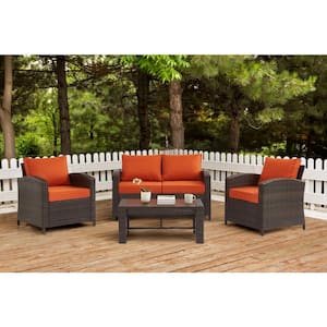4-Piece Wicker Patio Conversation Set with Orange Cushions
