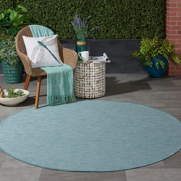 https://images.thdstatic.com/productImages/0a8d39d9-f626-54c6-9d34-7bb140bcaf9b/svn/aqua-nourison-outdoor-rugs-790743-fa_600.jpg