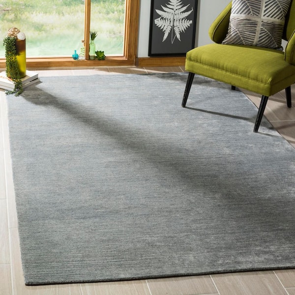 Mirage 6 ft. x 9 ft. Dark Gray Solid Color Distressed Area Rug