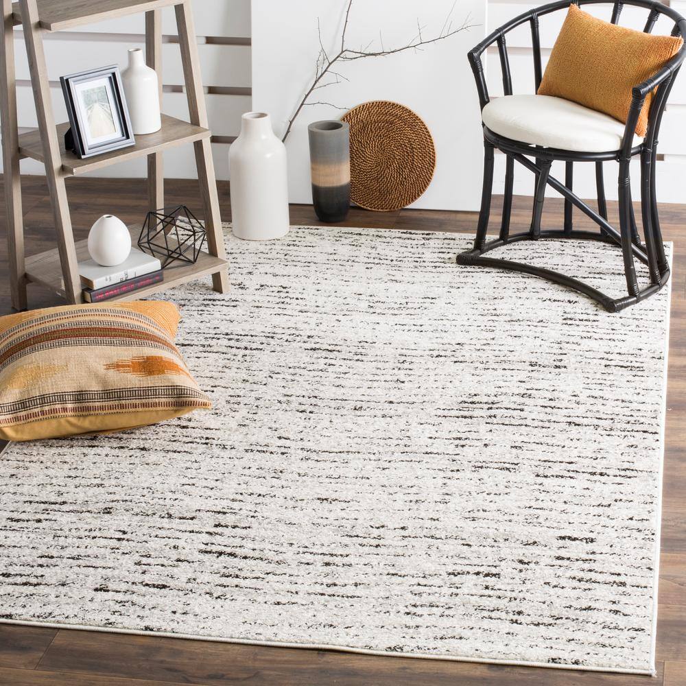 Ivory and Silver 8' x 10' Reversible Rectangular Area Rug