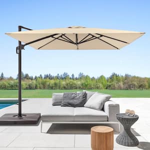 Sand Premium 10 ft. x 10 ft. Cantilever Patio Umbrella with a Base and 360° Rotation and Infinite Canopy Angle