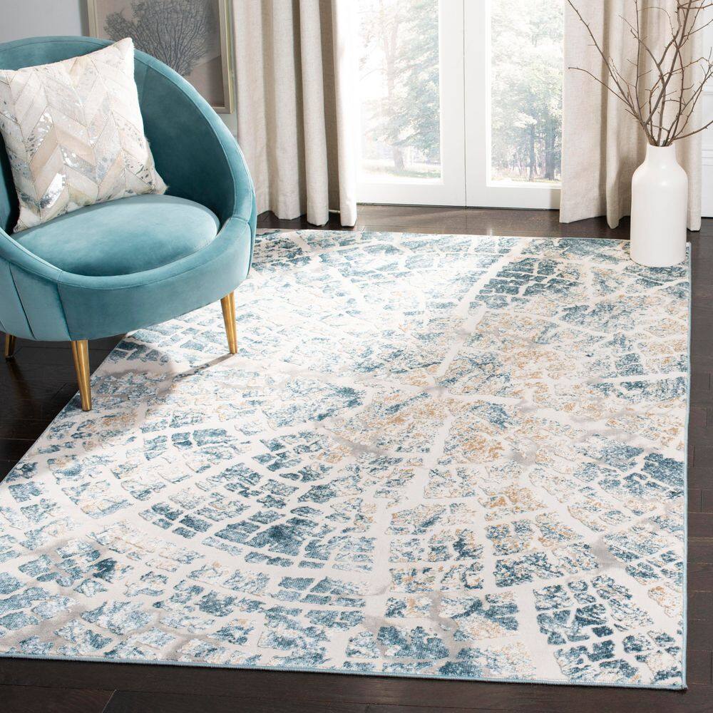 Vogue 4 ft. x 6 ft. Ivory/Teal Abstract Distressed Area Rug price history on PriceWatchPro