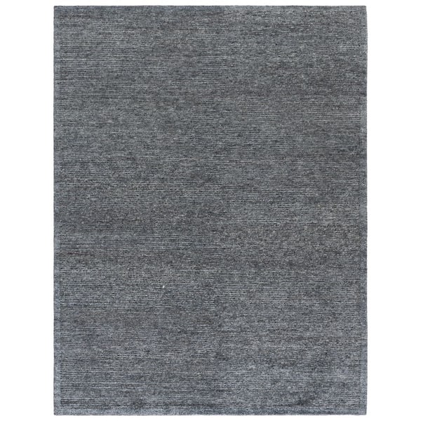 Tibetan 9 ft. x 12 ft. Black Solid Color Area Rug