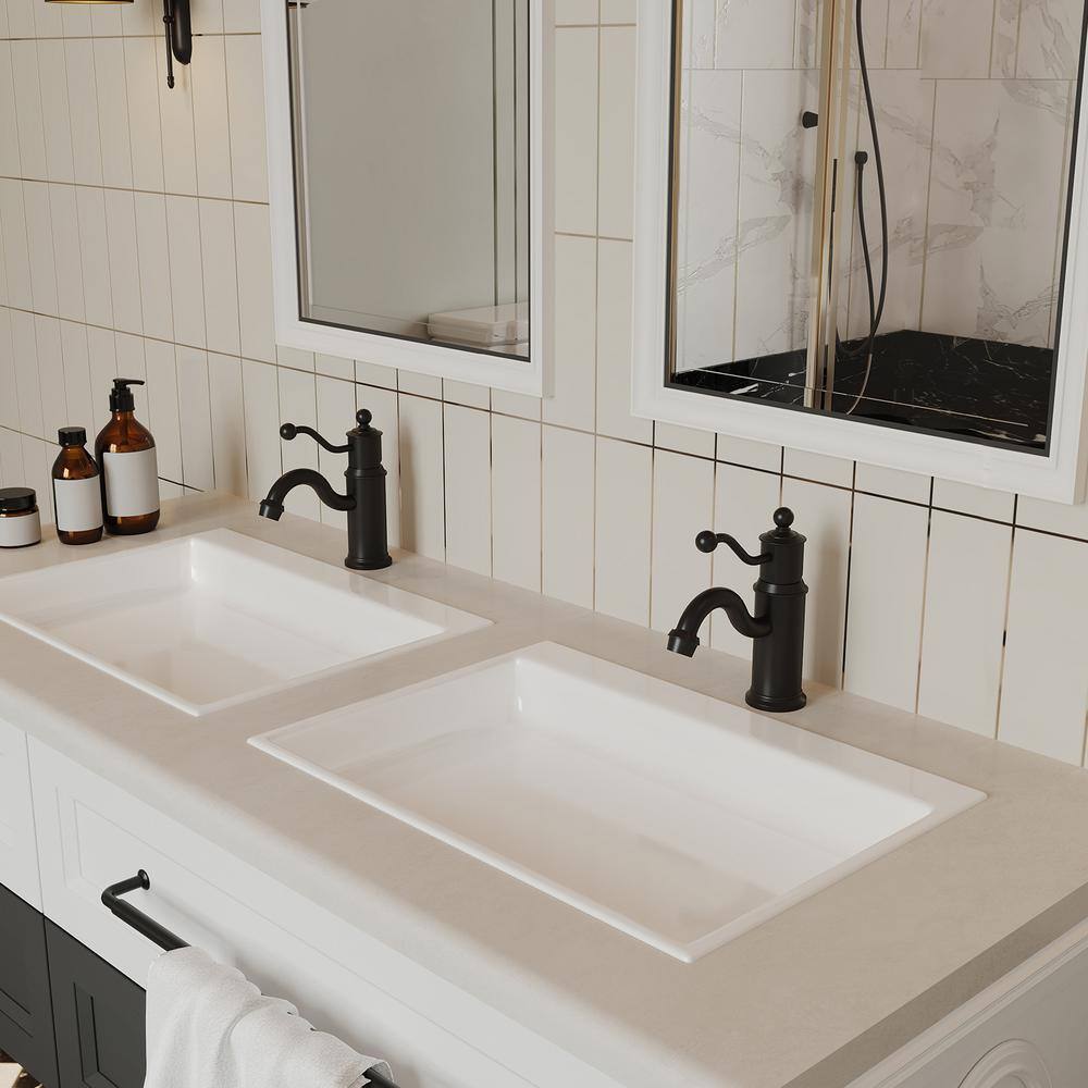 Matte Black Single-Handle Low-Arc Bathroom Faucet with Metal Drain