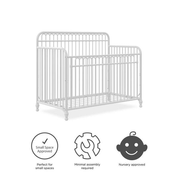 White metal convertible outlet crib