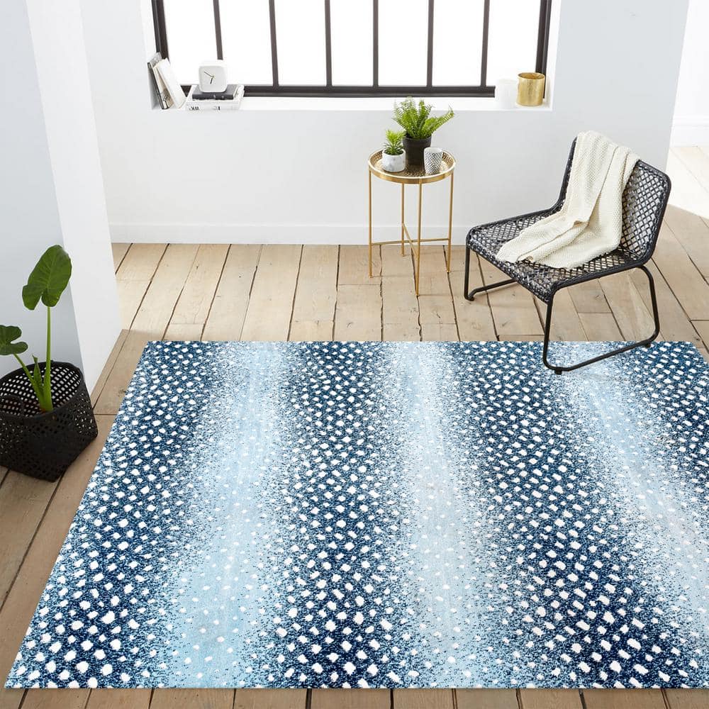 Abstract Antelope Blue and Cream 5' x 8' Easy-Care Area Rug
