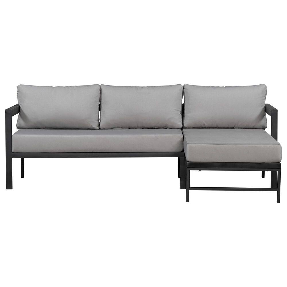 Metal outdoor sectional sofa with gray cushions on a plain background.