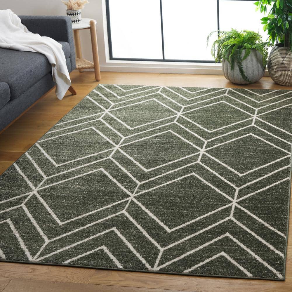 Ivory and Dark Green Geometric Synthetic Area Rug 5'1" x 7'6"