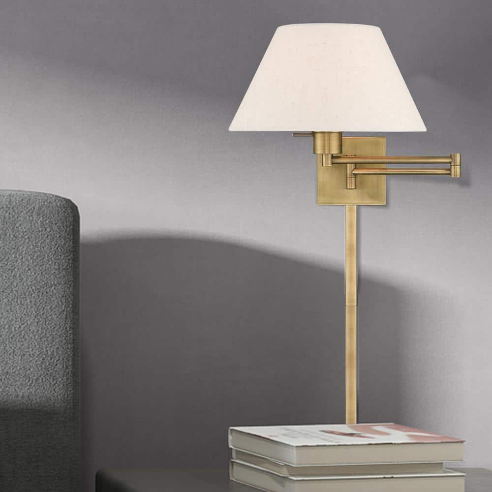 Antique Brass Swing Arm Wall Lamp with Oatmeal Fabric Shade