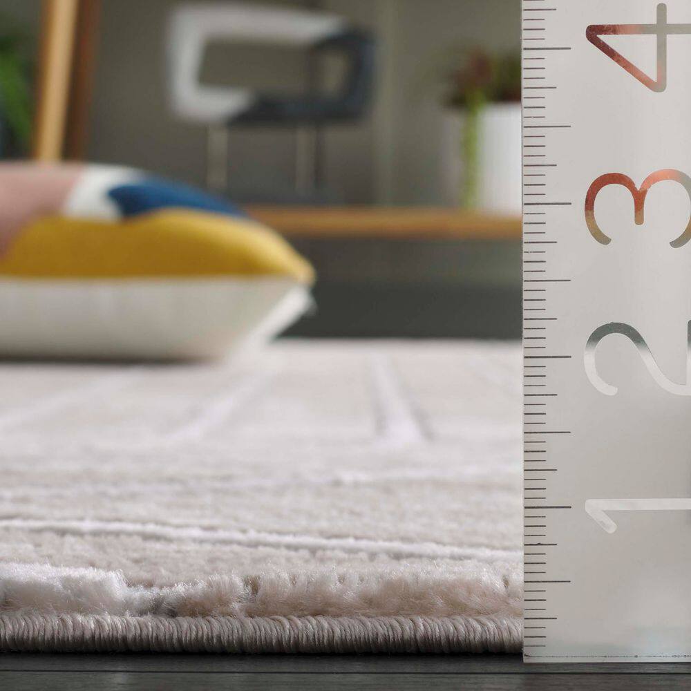 Beige and Grey Geometric 9' x 12' Synthetic Area Rug