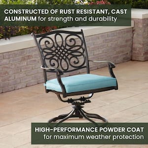 Traditions 7-Piece Aluminum Outdoor Dining Set with 6 Swivel Rockers with Blue Cushions and Cast-Top Table
