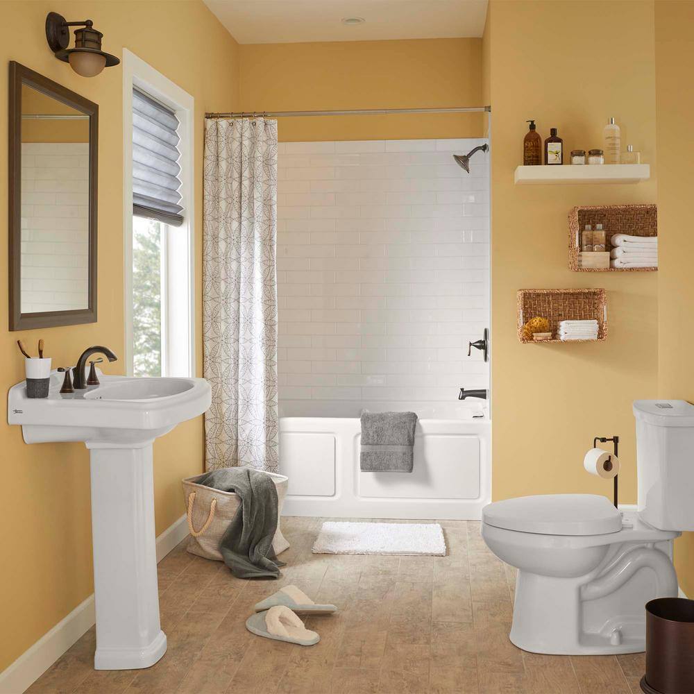 Legacy Bronze Dual-Handle Mid-Arc Bathroom Faucet with Speed Connect