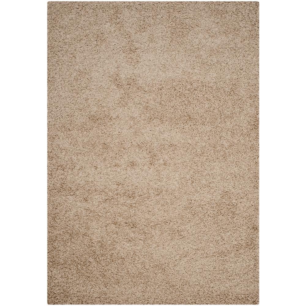 https://images.thdstatic.com/productImages/0b427ebd-e05e-4aff-967d-6d253cc3823c/svn/beige-safavieh-area-rugs-sga119g-6-64_1000.jpg