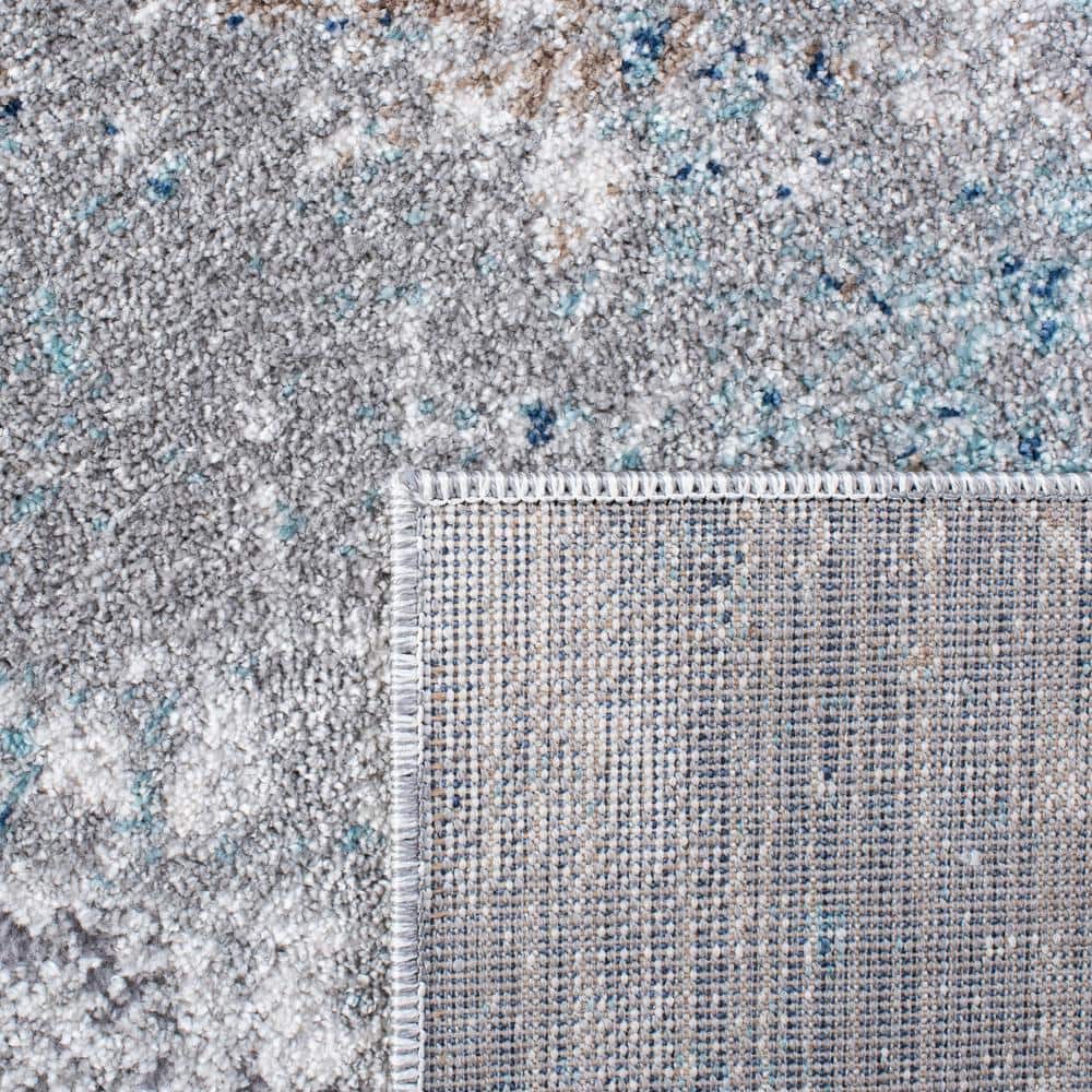 Abstract Blue Elegance 8' x 10' Synthetic Area Rug