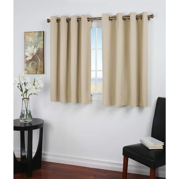 RICARDO Ivory Polyester Solid 56 in. W x 36 in. L Grommet Blackout Curtain