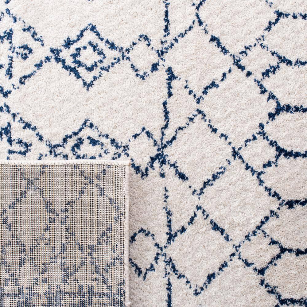 Ivory and Navy Moroccan Geometric 4' x 6' Area Rug