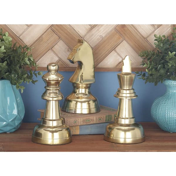 CosmoLiving by Cosmopolitan Gold Aluminum Chess Sculpture with Knight, Queen and King (Set of 3)