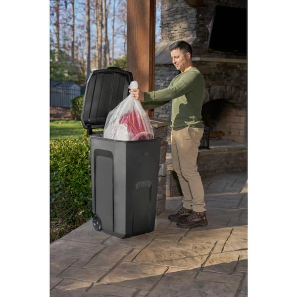 Rubbermaid Roughneck 45 Gal. Black Wheeled Vented Trash Can with Lid  2136425 - The Home Depot