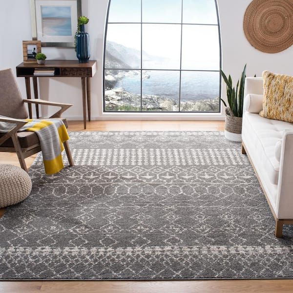 https://images.thdstatic.com/productImages/0b8ddd32-ec6a-4fda-943e-4e339a5a902e/svn/gray-ivory-safavieh-area-rugs-tul229f-8-e1_600.jpg