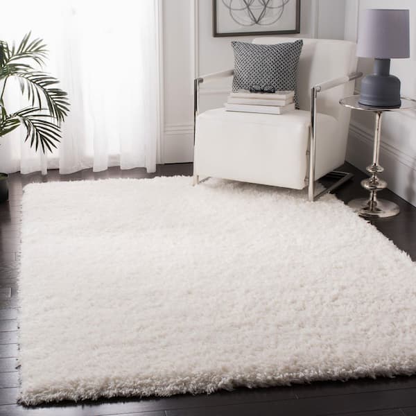 Flokati Ivory 5 ft. x 8 ft. Solid Area Rug