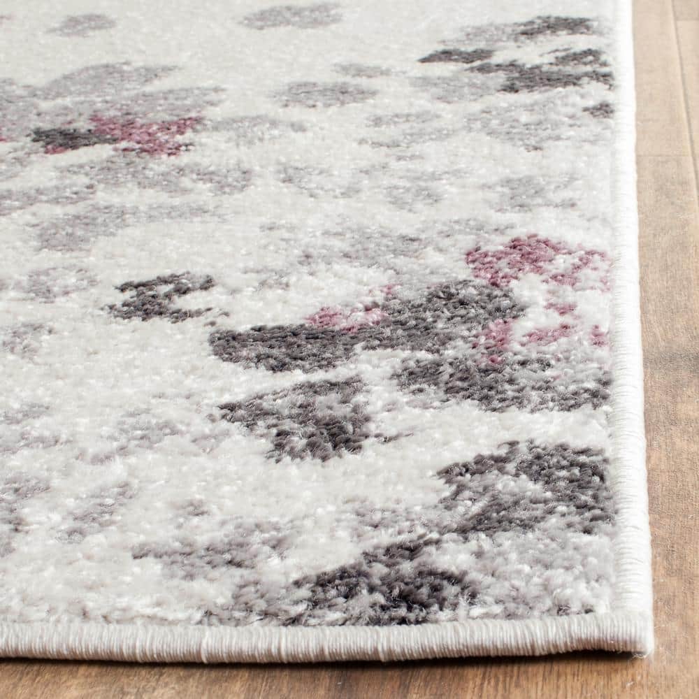 Ivory and Purple Floral Synthetic Area Rug, 6' x 9'