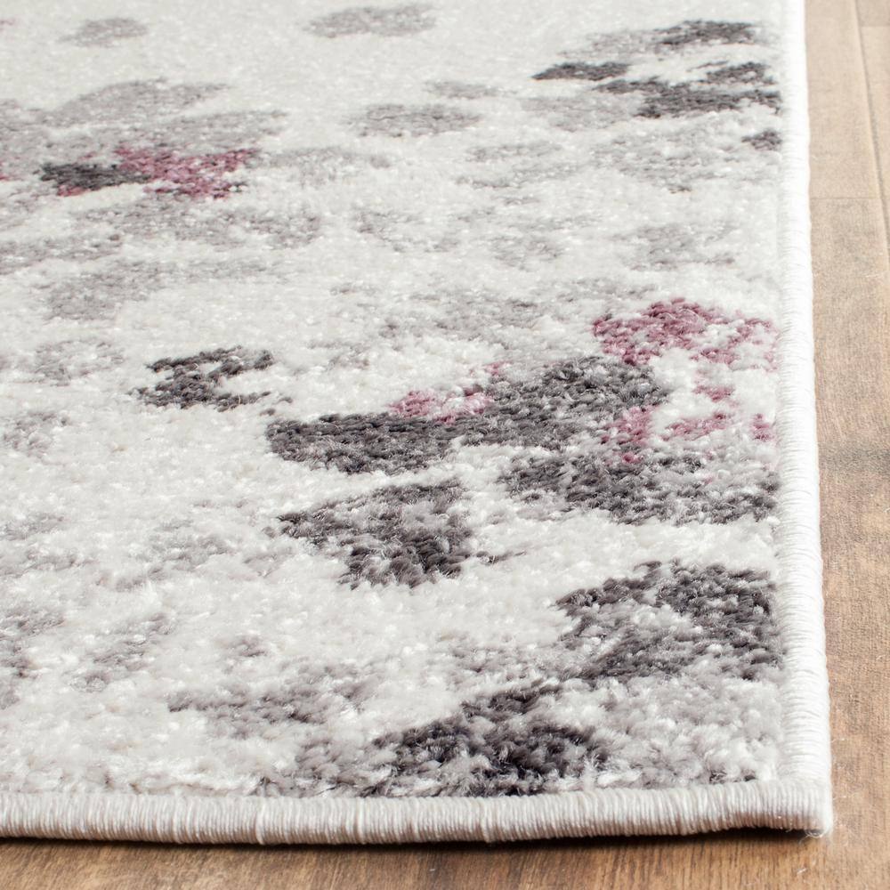 Ivory & Purple Floral 9'x12' Reversible Synthetic Area Rug