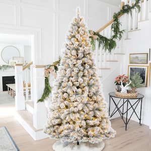 9 ft. Pre-Lit Snow Flocked Artificial Spruce Christmas Tree with 900 Warm White Lights