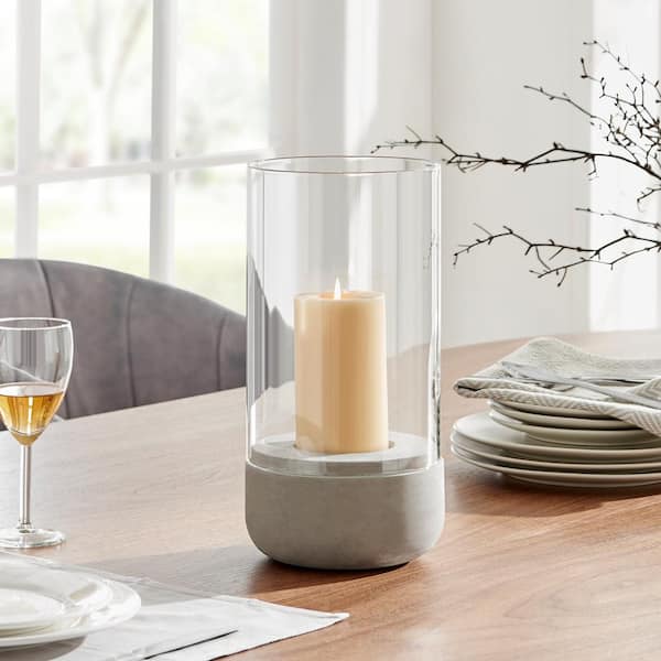 https://images.thdstatic.com/productImages/0be0db48-38c8-557f-8137-6d16c6fc6a36/svn/cement-clear-danya-b-candle-holders-se3270-e1_600.jpg