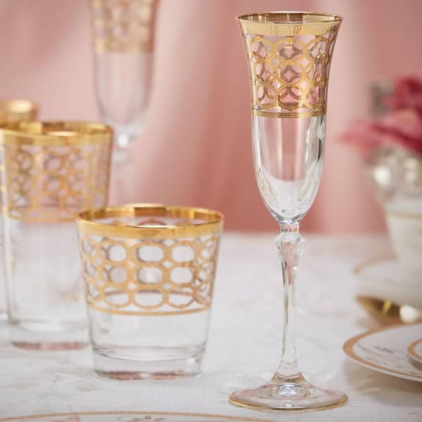 https://images.thdstatic.com/productImages/0bf3128f-c6b5-403b-922f-3de07d0872a5/svn/lorren-home-trends-champagne-glasses-1502-1f_600.jpg