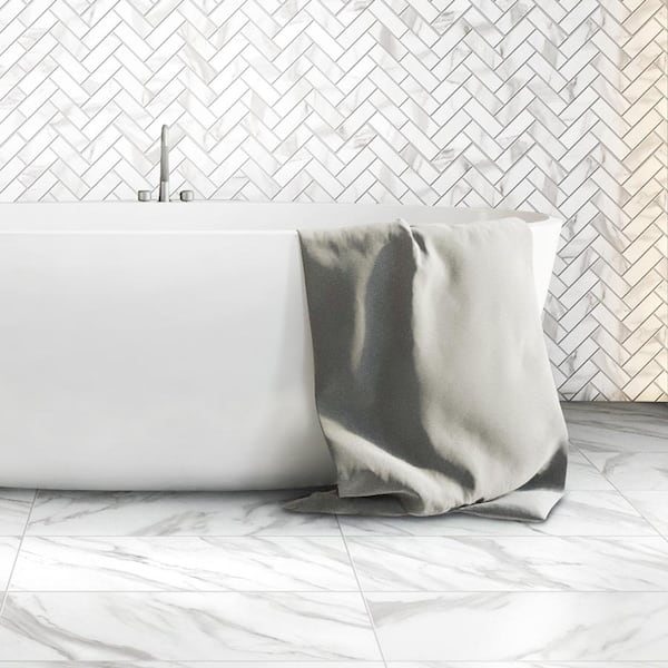 Avante Bianco 12 in. x 15 in. Herringbone Matte Porcelain Floor and Wall Mosaic Tile (4.77 sq. ft. / case) Avante Bianco 12 in. x 15 in. Herringbone Matte Porcelain Floor and Wall Mosaic Tile (4.77 sq. ft. / case)