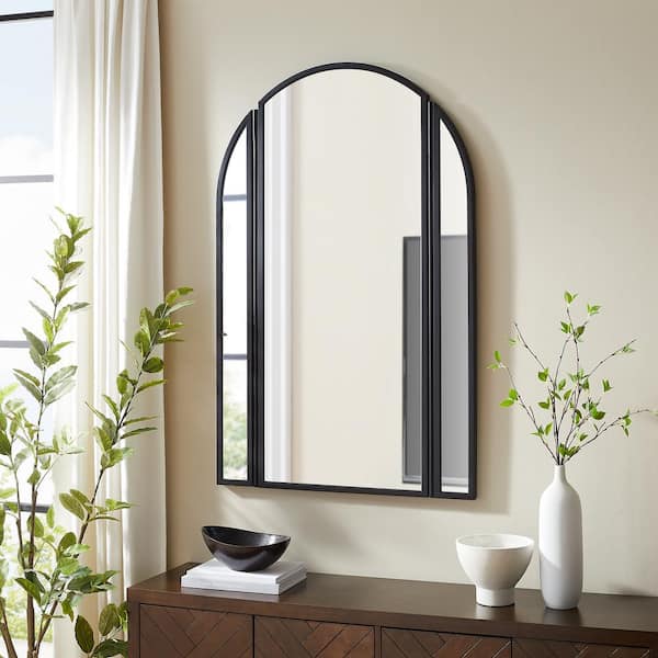 Welwick Designs 48 in. H x 31 in. W Black Metal Arch Modern Mirror with Hinged Sides