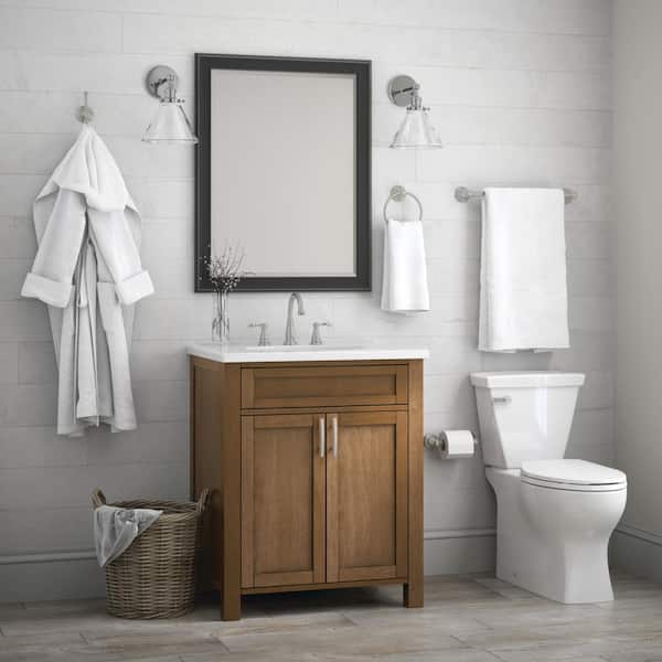 https://images.thdstatic.com/productImages/0c06ffff-c7fc-4c12-b961-d0c08019c55b/svn/brushed-nickel-delta-toilet-paper-holders-ptr50-bn-77_600.jpg