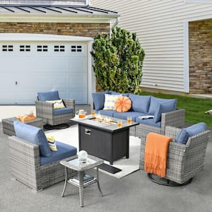 Harlotte 9-Piece Wicker Patio Rectangular Fire Pit Set with Denim Blue Cushions and Swivel Rocking Chairs