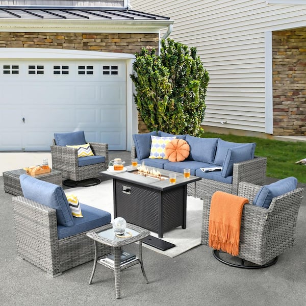 XIZZI Harlotte 9-Piece Wicker Patio Rectangular Fire Pit Set with Denim Blue Cushions and Swivel Rocking Chairs
