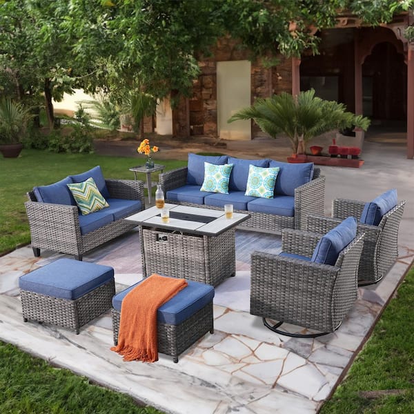 XIZZI Moonshadow Gray 8-Piece Wicker Patio Rectangular Fire Pit Set with Denim Blue Cushions and Swivel Rocking Chairs