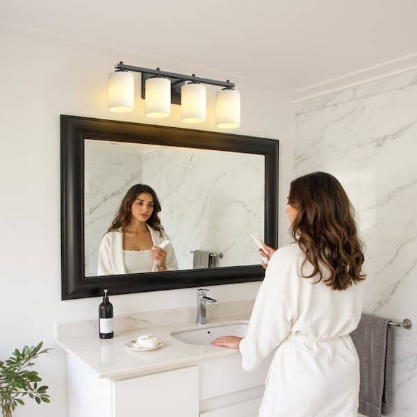 24 in. 4-Light Frosted Glass Vanity Light with Black Iron Frame for Bathroom