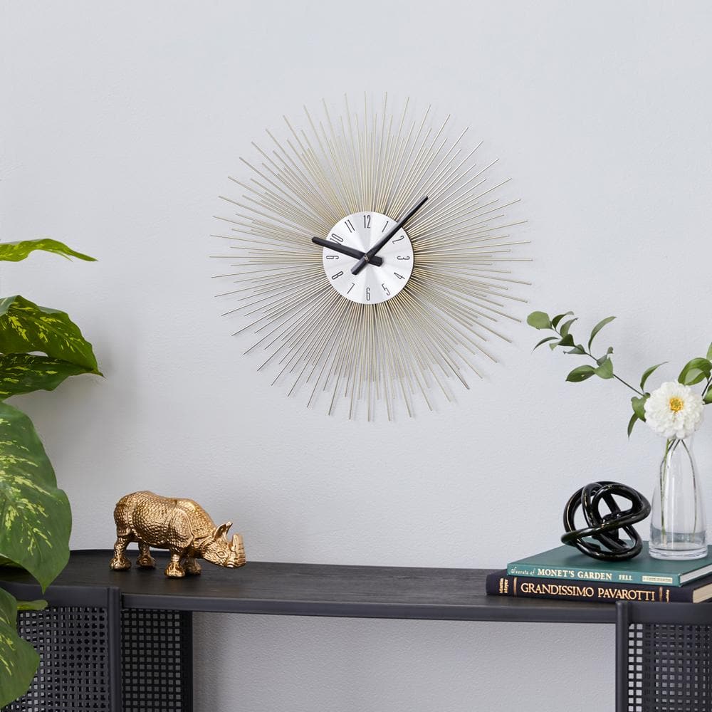 19" Gold Starburst Metal Wall Clock with Black Accents