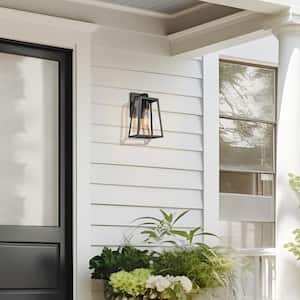Modern Textured Black 1-Light Outdoor Lantern Sconce Clear Glass Shade Linear Cage Weather Resistant Wall Light