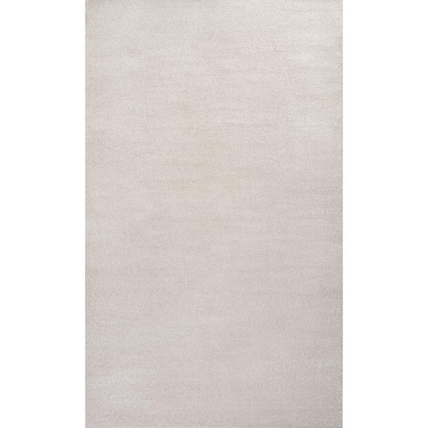 Haze Solid Low-Pile Ivory 6 ft. x 9 ft. Area Rug