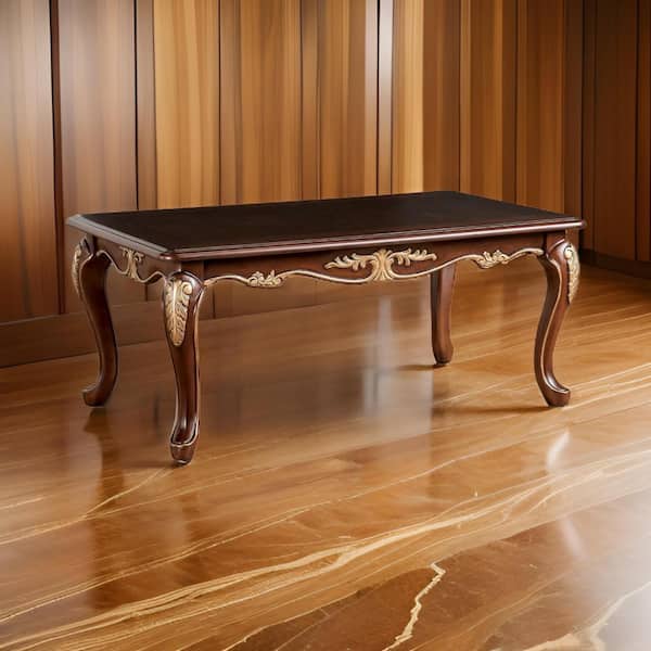 Benjara Saili 27.5 in. Tobacco Brown and Gold Rectangle Wood Coffee Table with Gold Carvings and Cabriole Legs