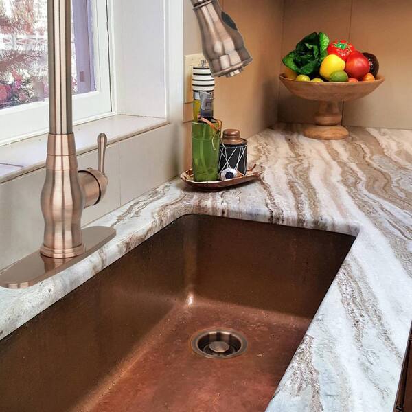 https://images.thdstatic.com/productImages/0c72ee2d-abda-4981-8f86-cfb2778b3a49/svn/antique-copper-akicon-sink-strainers-ak82201-ac-c3_600.jpg