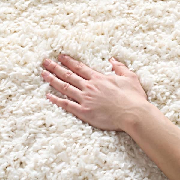 August Shag Ivory 3 ft. x 5 ft. Solid Area Rug