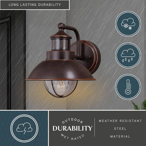 VAXCEL Harwich Bronze Motion Sensor Dusk to Dawn Coastal Outdoor