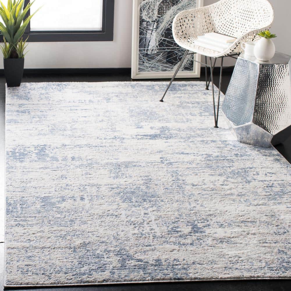 Ivory and Blue Abstract Square Synthetic Area Rug
