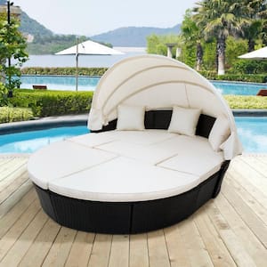 Black Wicker Outdoor Day Bed with Beige Cushions and Retractable Canopy